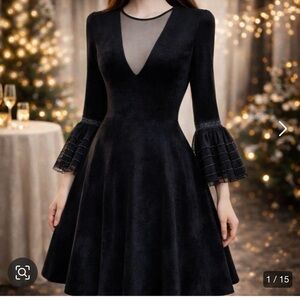 Antonino Valenti Elegant Black Dress with Sheer Details/skater dress